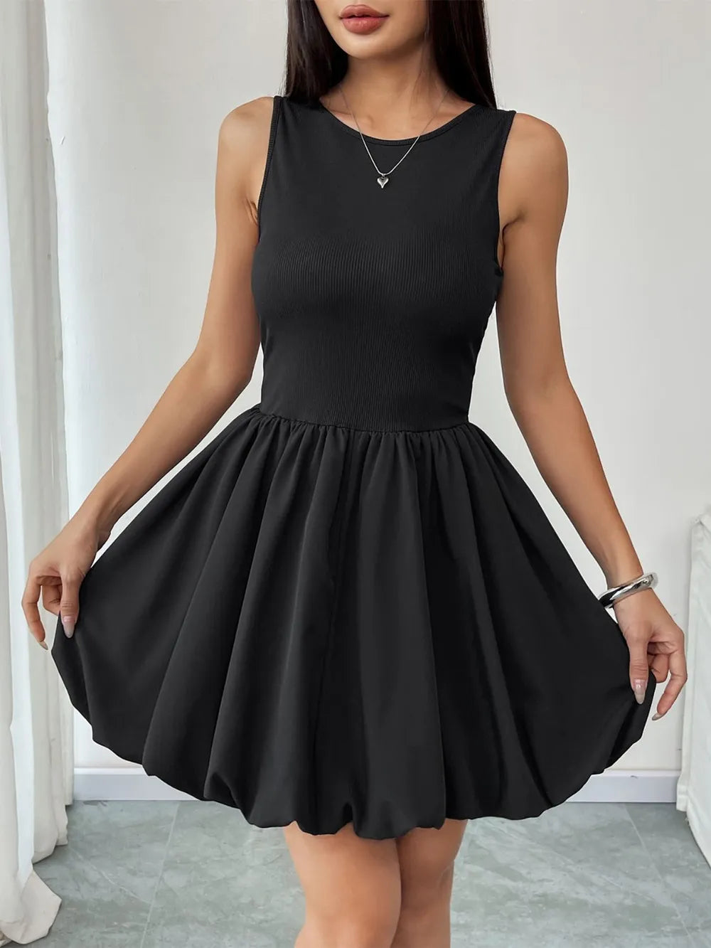 Ruched sleeveless mini dress in black, fitted bodycon party dress by Vilmere