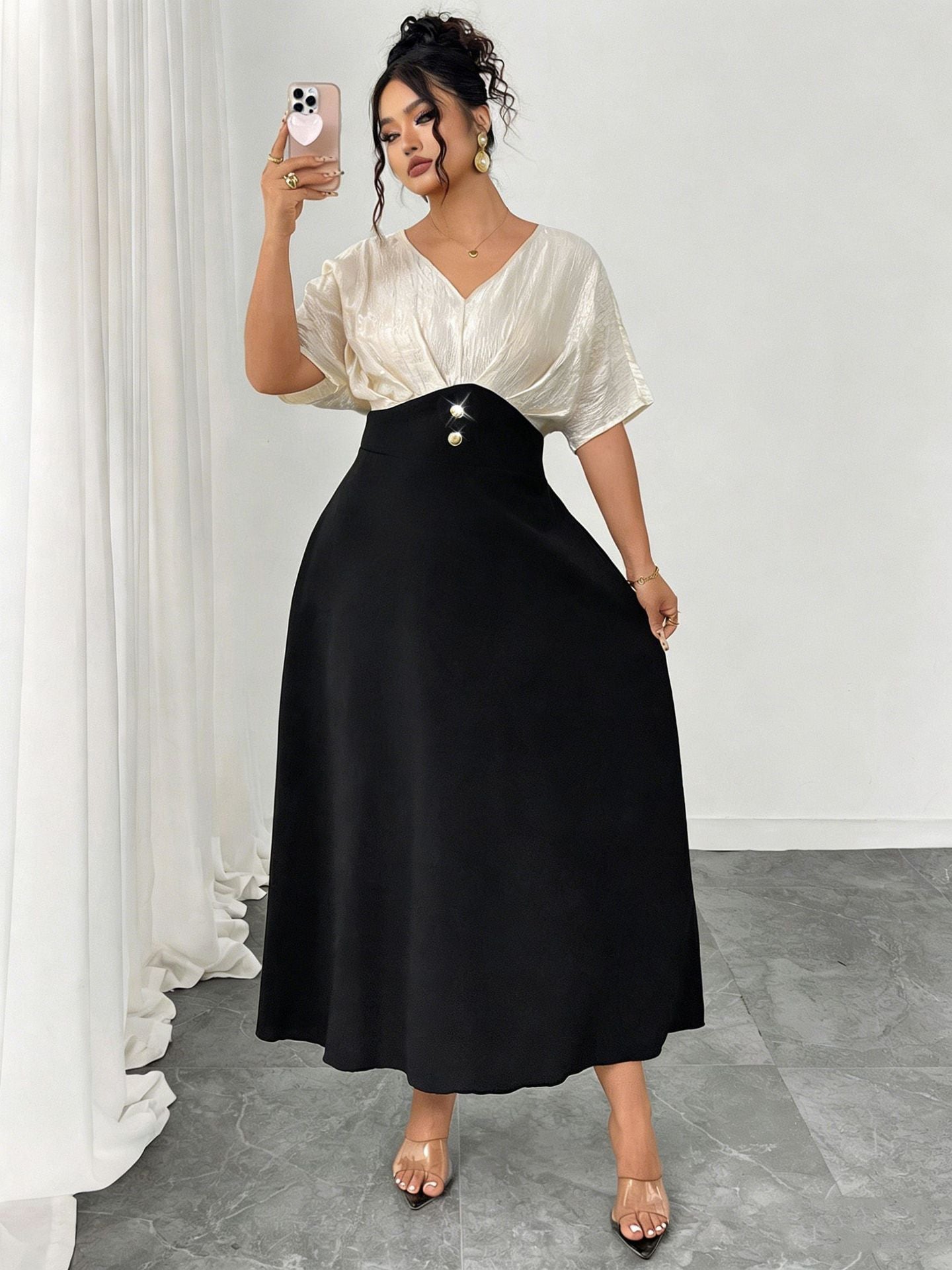 A line dress styled for party wear